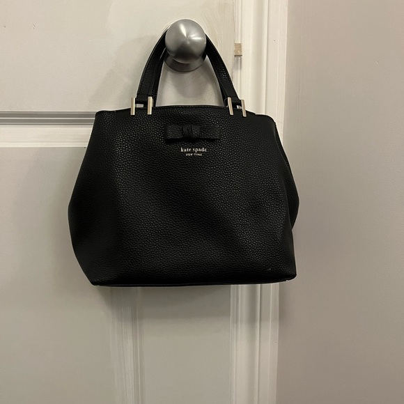 Beautiful black Kate Spade purse with gold detailing and pink suede interior. - Picture 1 of 2